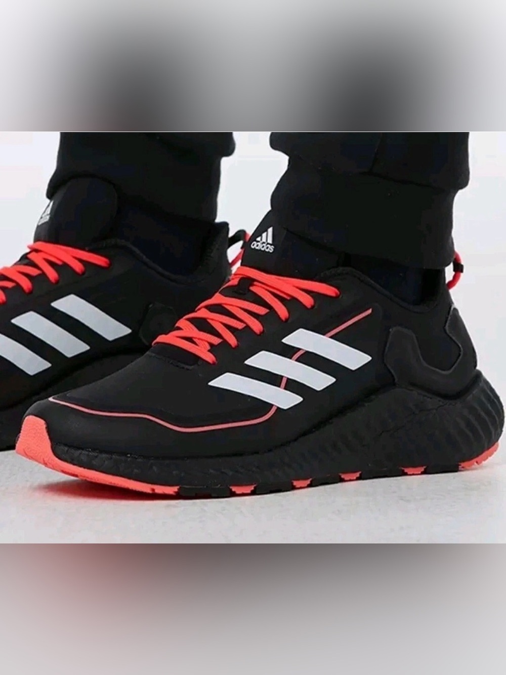 adidas Men’s Black Athletic Shoes with Coral Accents